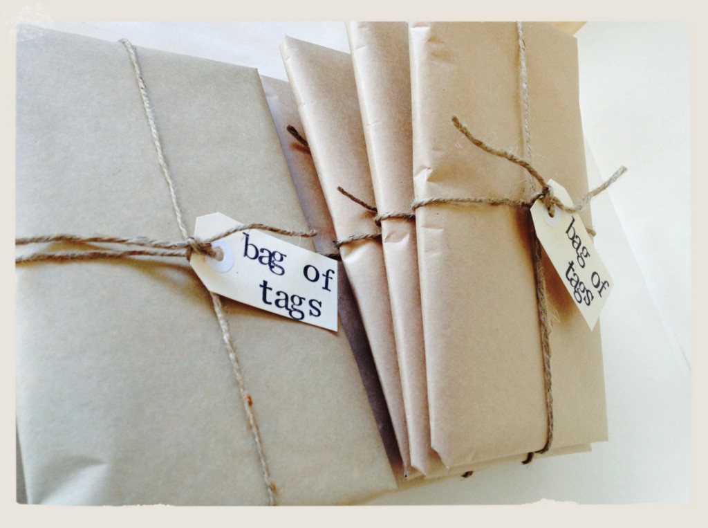 bags of tags in brown paper